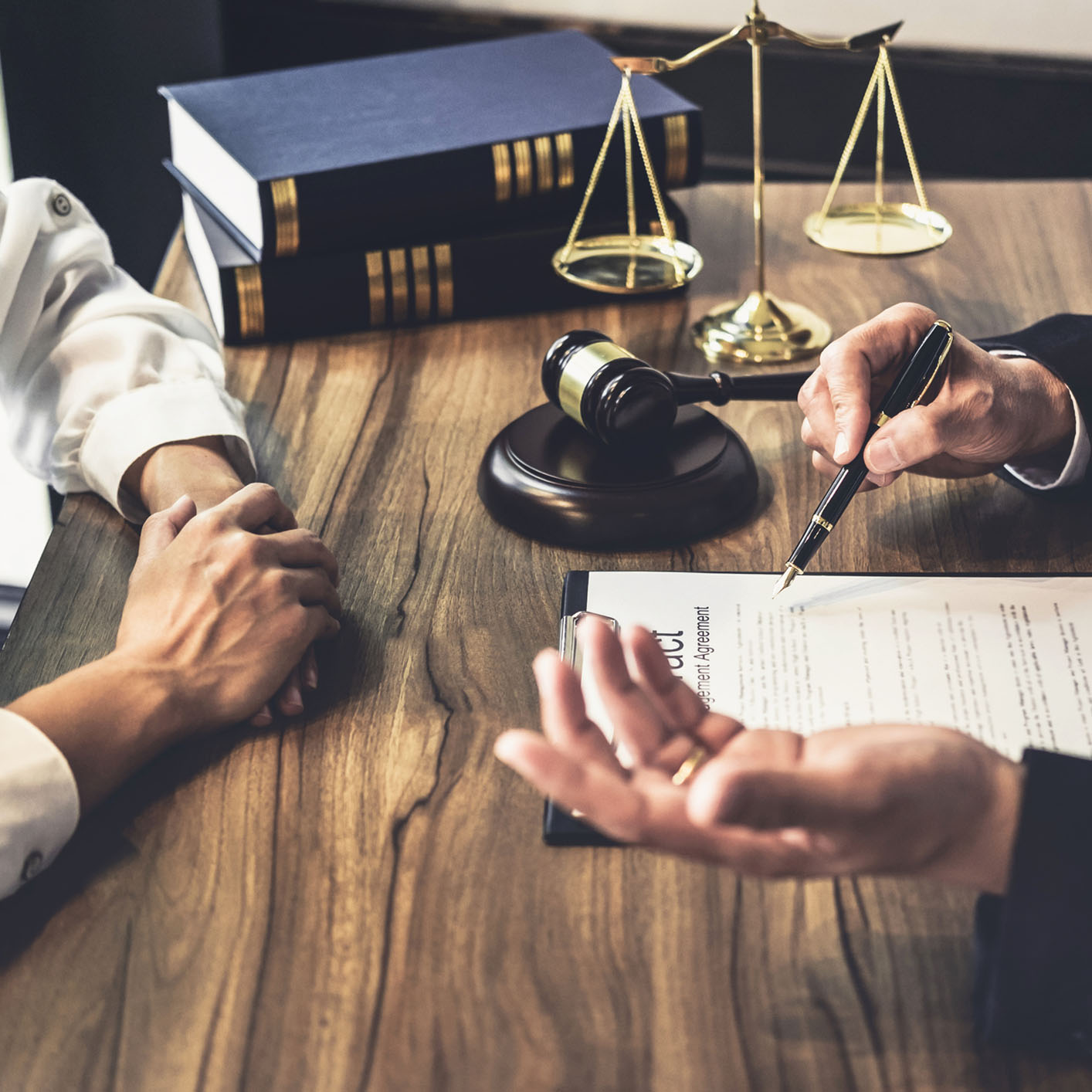 Close up on lawyers discussing their case